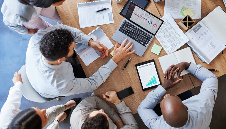 Business team reviewing marketing data in a meeting