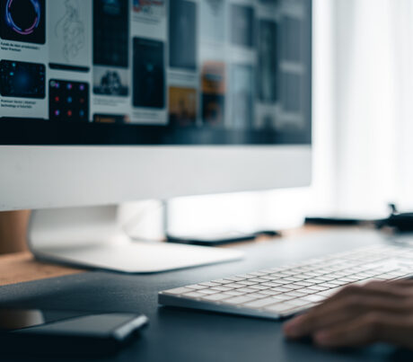 Developer working at a computer desk