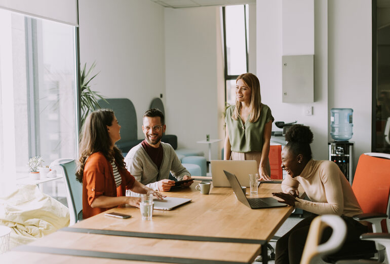 Young multiethnic startup team collaborating in a modern office